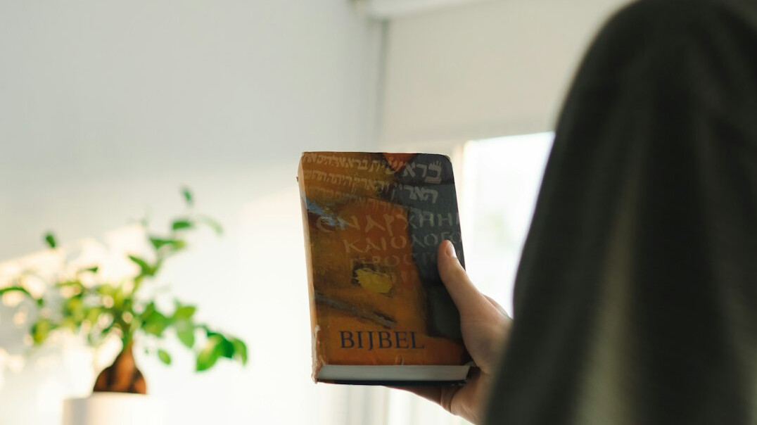 detective reading old book
