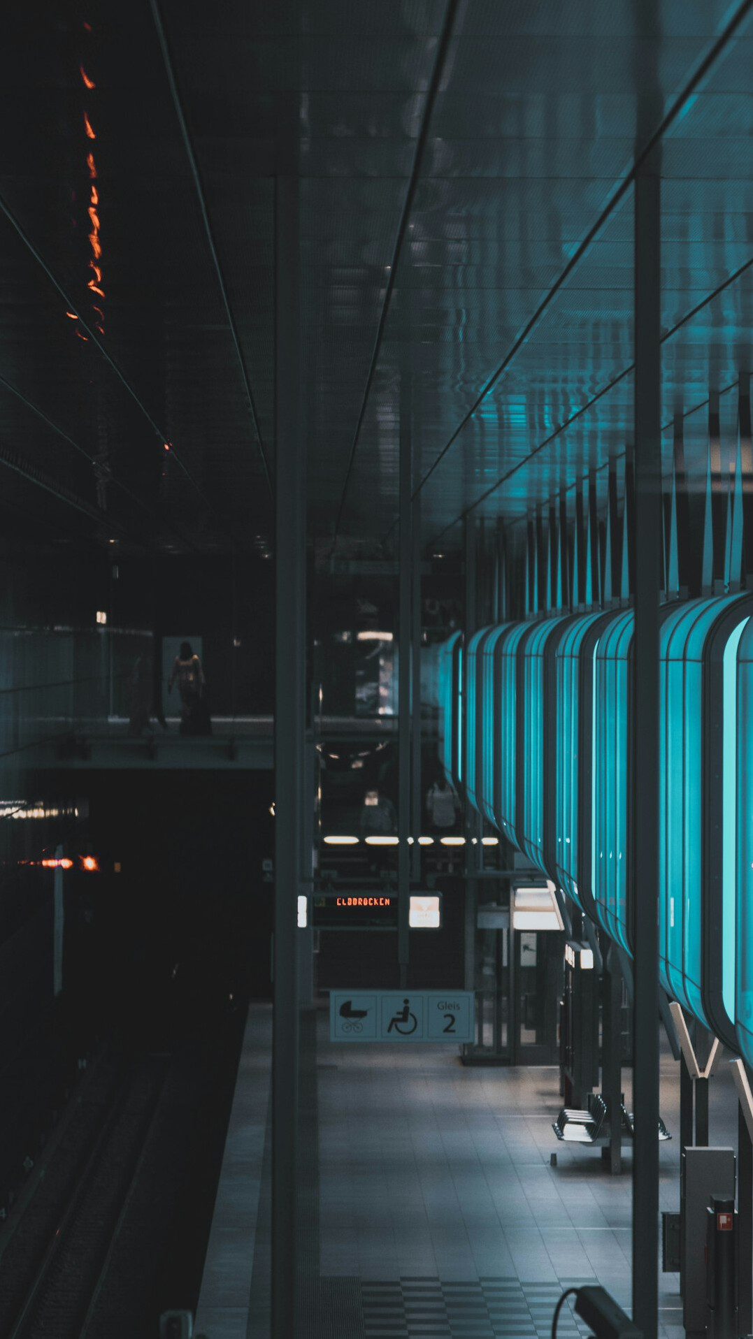 Rows of server racks with blue indicator lights