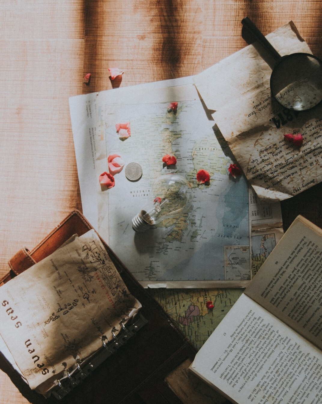 vintage magnifying glass on map