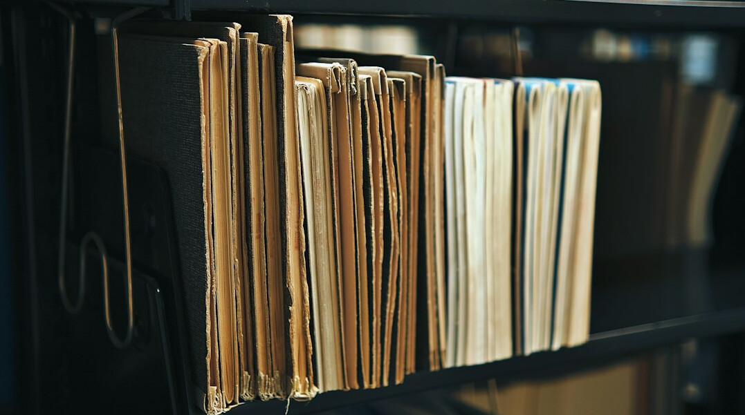detective reading case files