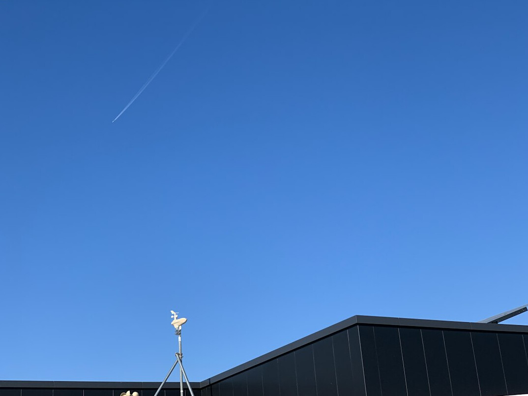Satellite dish against a clear sky