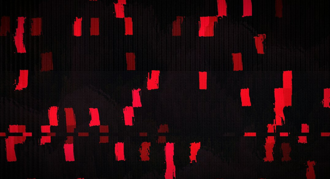 Digital data stream on a dark screen